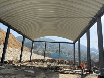 四川達州水泥廠料棚拱形屋頂工程